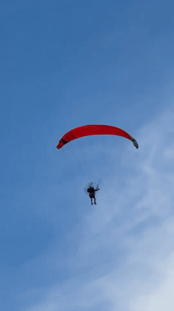 Tel Aviv scenes: paragliding, drinks, and beach sunbathing