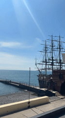 Family enjoys seaside lunch with harbor view in Sochi