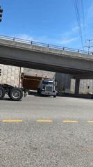 Driving school semi-truck exits overpass in Coquitlam
