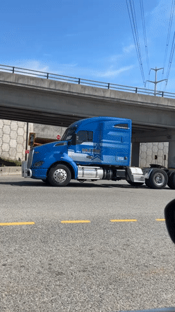 Driving school semi-truck exits overpass in Coquitlam