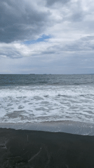 Coastal day captures beach, dining, art exhibition, travel scenes