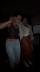 Women dancing at late-night party in central London