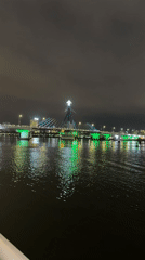 Nighttime photography session captures illuminated Đà Nẵng bridges and skyline