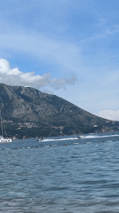 Beach activities and boating captured in Budva, Montenegro