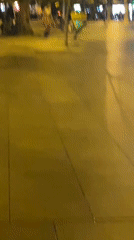 Night skateboarder spotted on Barcelona streets amid yellow lighting