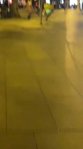 Night skateboarder spotted on Barcelona streets amid yellow lighting
