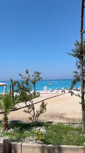 Sunny morning at a crowded Fethiye beach