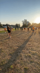 Group meets on a summer evening sports field in Kiten, Bulgaria