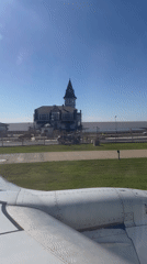 Passenger documents aircraft interior views during Buenos Aires airport operations