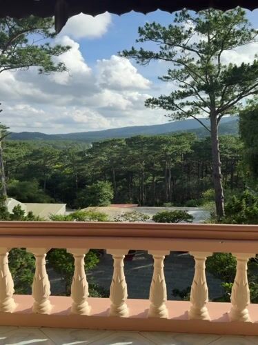 Tourist captures scenic Da Lat valley views from balcony