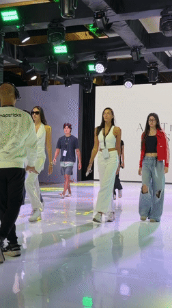Fashion show documented by attendees in Denpasar, Indonesia