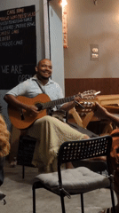 Street musician performs in northern India tourist district