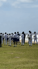 Youth marching band rehearses near ocean in Matara, Sri Lanka