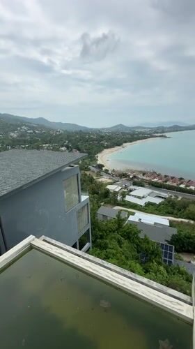 Rooftop coastal view captured in Thailand during cloudy morning