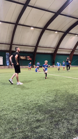 Youth soccer practice session at indoor facility in Podgorica