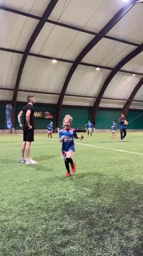 Youth soccer practice session at indoor facility in Podgorica