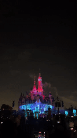 Castle light show and fireworks draw crowds in Pudong at night