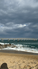 Beach day activities captured at Badalona pier