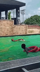 Afternoon pool session at a green-water facility in Nkpor
