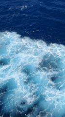 Aerial view captures calm ocean waters during daytime