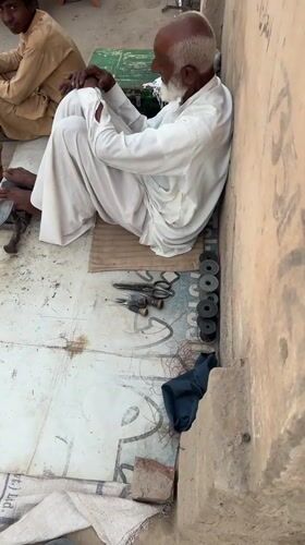 Street vendors conduct daily business in Multan, Pakistan