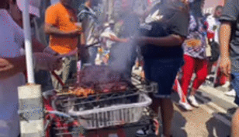 NYC street festival with food vendors and patriotic attire