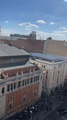 Classical Madrid architecture with ornate dome captured on video