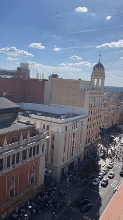 Classical Madrid architecture with ornate dome captured on video