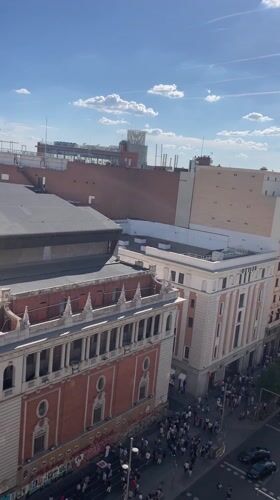 Classical Madrid architecture with ornate dome captured on video