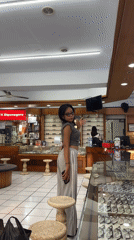 Woman shops for glasses at Denpasar optical store