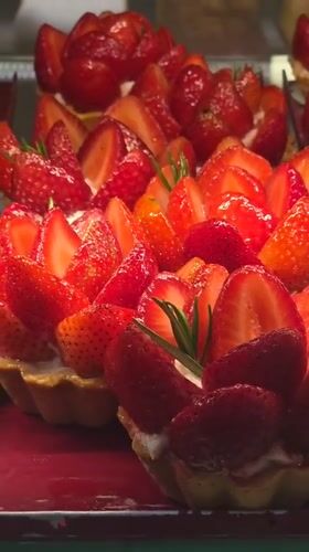 Warsaw bakery display case showcases variety of desserts