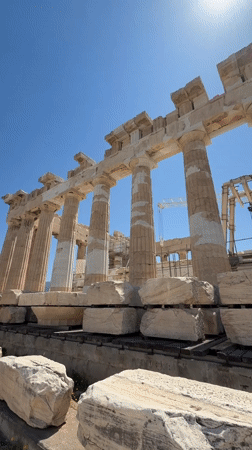 Tourist documents sunny visit to Athens Parthenon