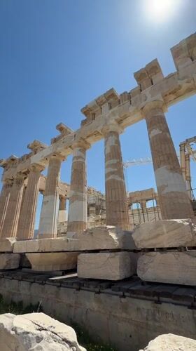 Tourist documents sunny visit to Athens Parthenon