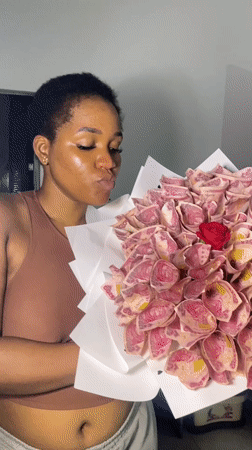 Birthday celebration in Ado with naira bouquets, cake, and gifts