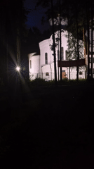 Evening walk through lit park grounds with nature and street art