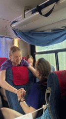 Friendly passenger interaction observed on bus in Lesnoi, Russia
