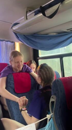 Friendly passenger interaction observed on bus in Lesnoi, Russia