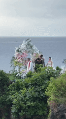 Clifftop wedding ceremony overlooks ocean in Kuta Selatan