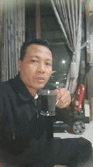 Coffee and toy cars on a tiled floor in Waung