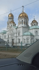 Orthodox cathedral with golden domes observed in Kultaevo, Russia