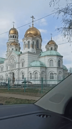Orthodox cathedral with golden domes observed in Kultaevo, Russia