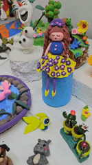 Handmade clay figurines and tiny dioramas up close