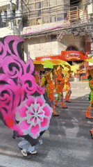 Traditional costume parade winds through Dumaguete streets Friday morning