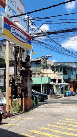 Street pause near an Indomaret in sunny Denpasar