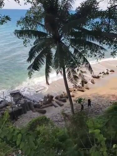 Tropical beach scene documented at Batulayar Barat, Indonesia