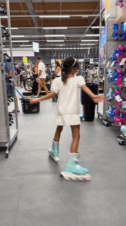 Roller skating through a store aisle in Tarragona