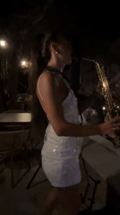 Live saxophone under the lights in Pečurice, Montenegro