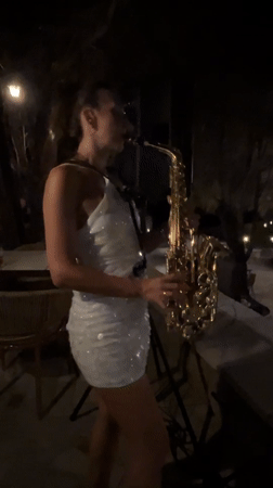 Live saxophone under the lights in Pečurice, Montenegro