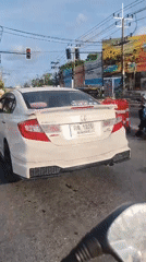 White Honda Civic spotted at Thailand traffic light