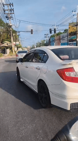 White Honda Civic spotted at Thailand traffic light